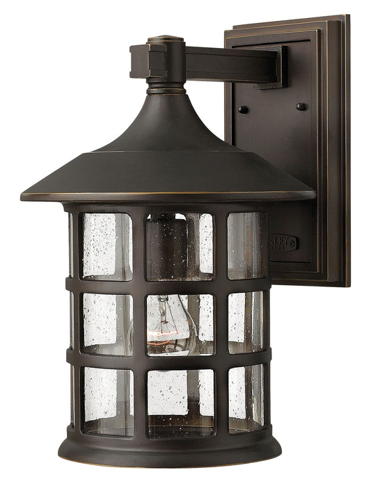 Freeport Medium Wall Mount Lantern In Light Bronze Finish