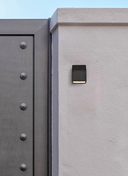 Raine Integrated LED wall sconce in black