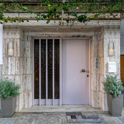 Raine Integrated LED wall sconce in silver