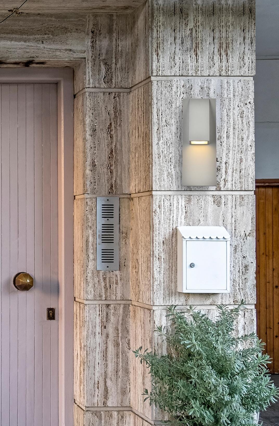 Raine Integrated LED wall sconce in silver