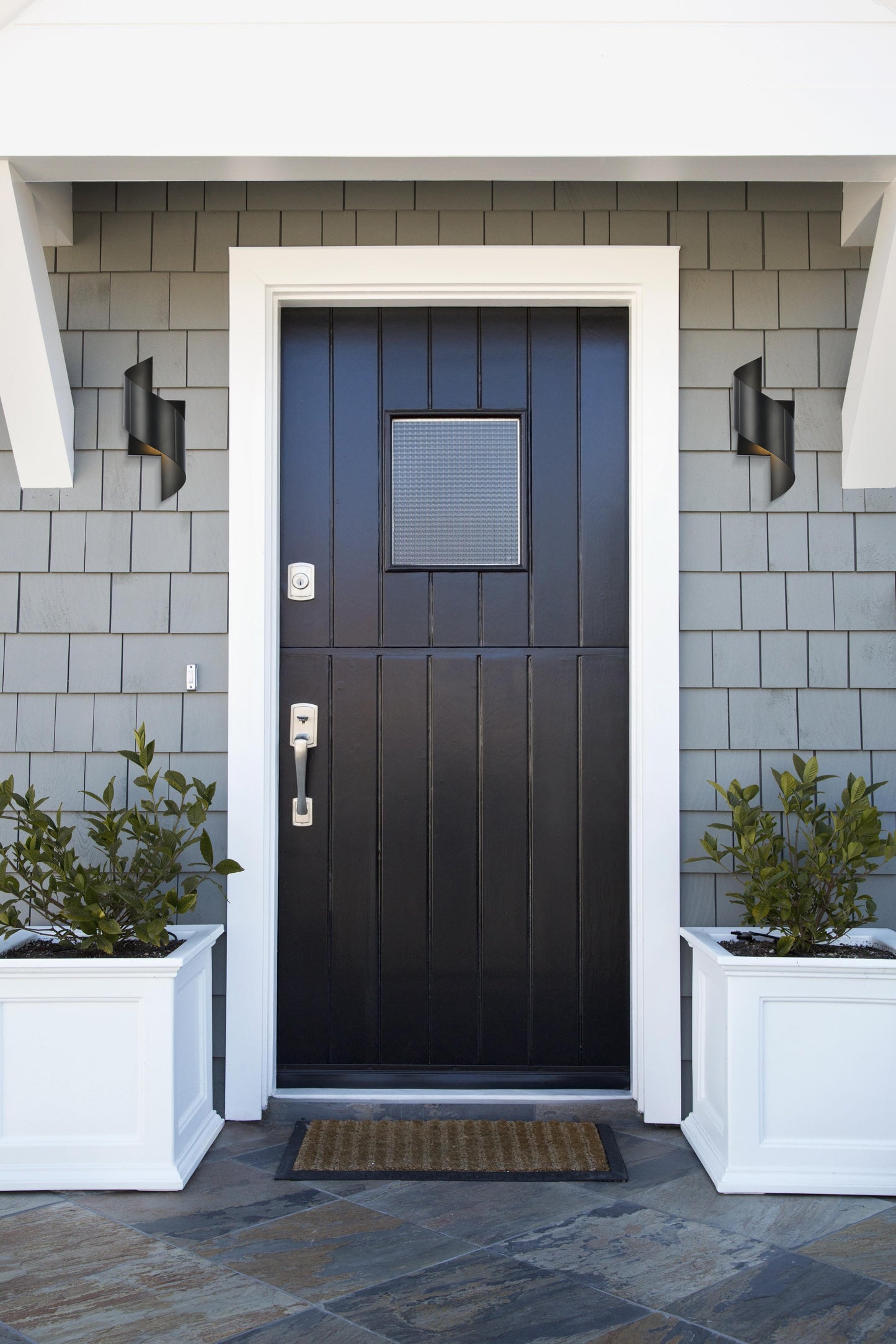 Raine Integrated LED wall sconce  in black