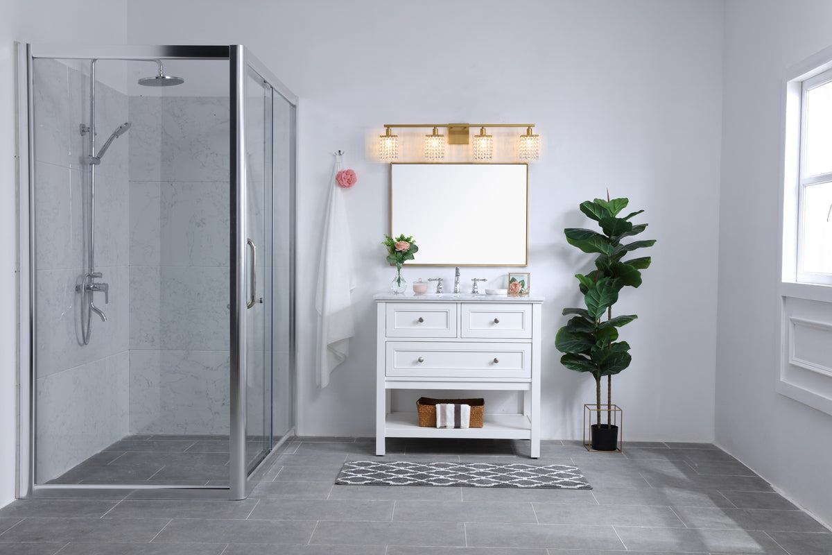 Phineas 4 light Brass and Clear Crystals wall sconce