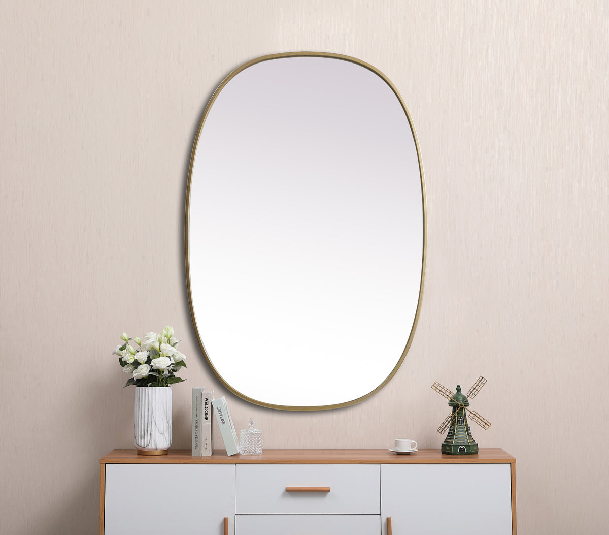 Metal Frame Oval Mirror 27x40 Inch in Brass