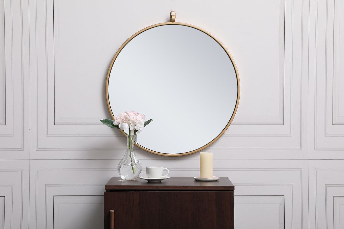 Metal frame round mirror with decorative hook 21 inch in Brass