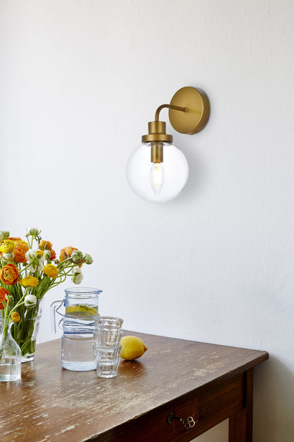 Hanson 1 light bath sconce in brass with clear shade