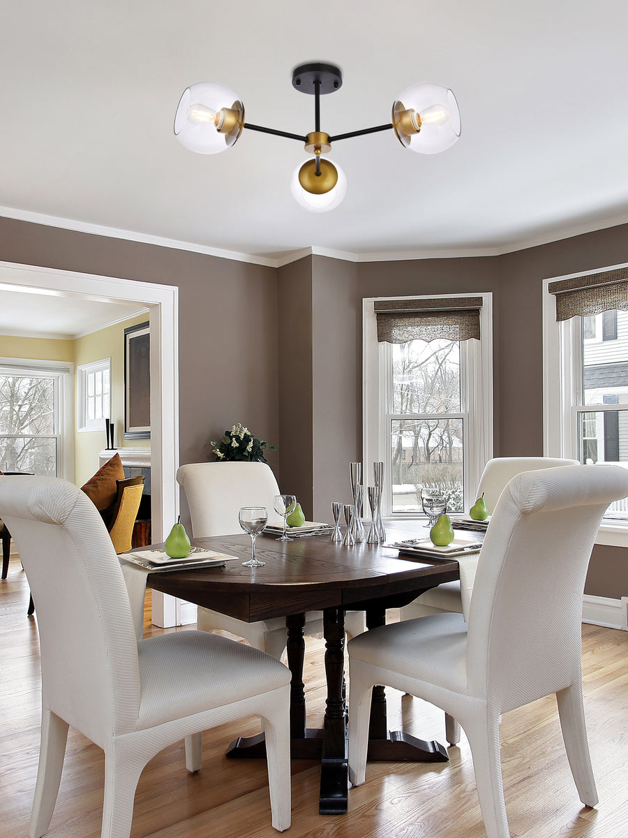 Briggs 26 inch flush mount in black and brass with clear shade