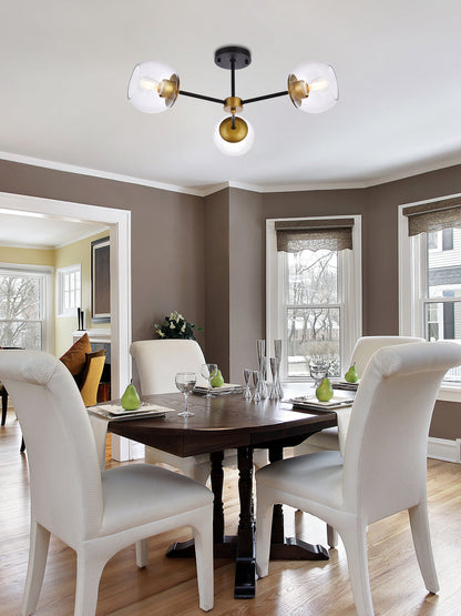 Briggs 26 inch flush mount in black and brass with clear shade