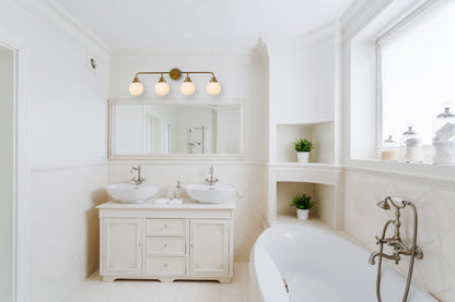 Hanson 4 lights bath sconce in brass with frosted shade