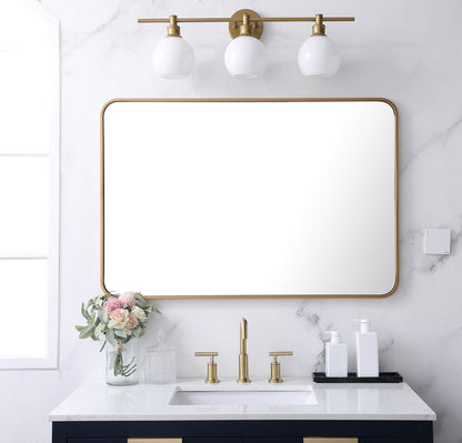 Soft corner metal rectangular mirror 27x40 inch in Brass