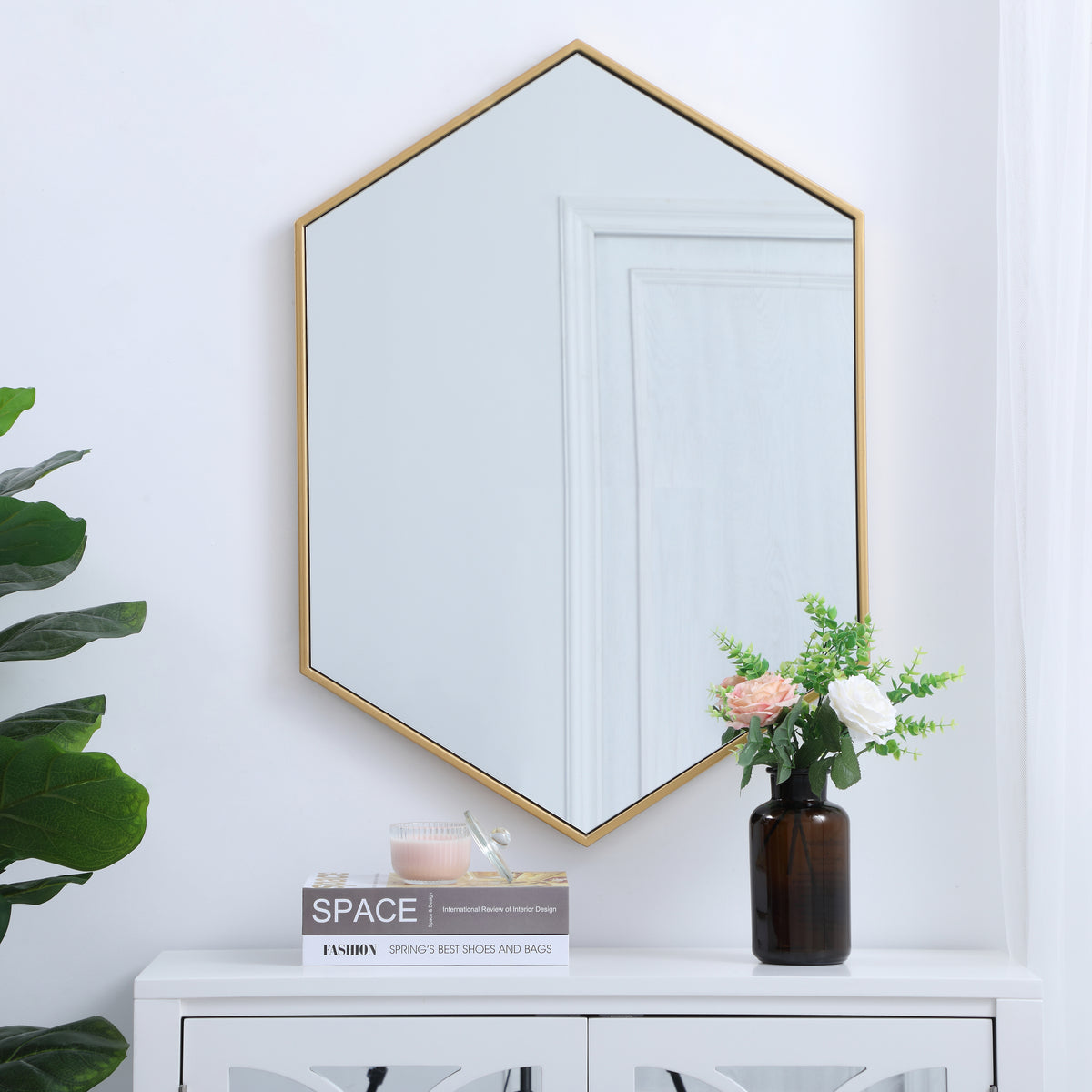 Metal frame hexagon mirror 24 inch in Brass