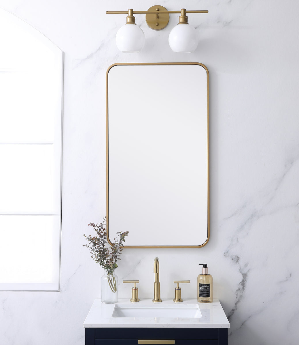 Soft corner metal rectangular mirror 20x36 inch in Brass