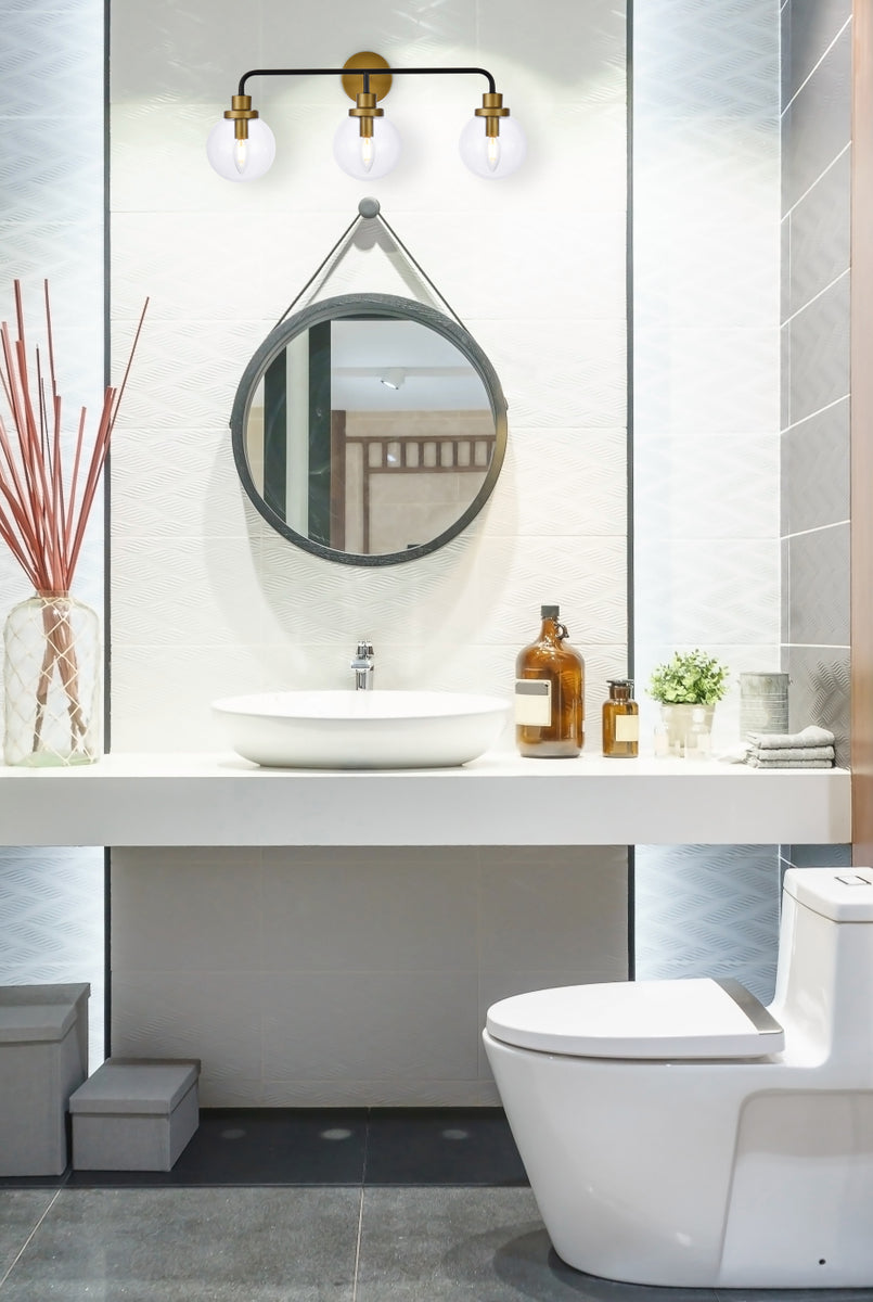 Hanson 3 lights bath sconce in black with brass with clear shade