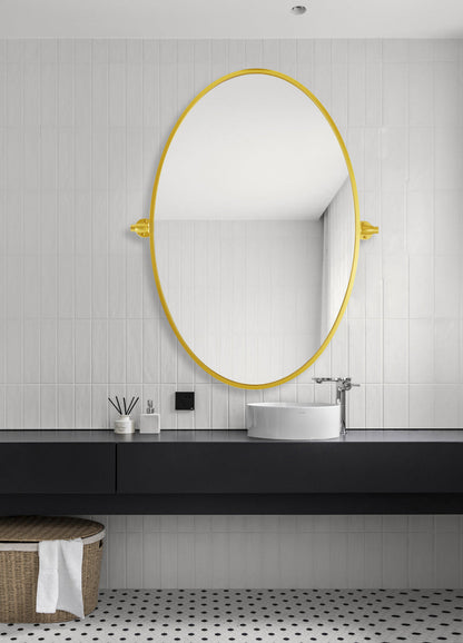 Oval pivot mirror 21x32 inch in gold