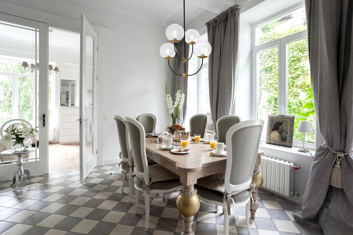 Lennon 31.5 inch pendant in black and brass with clear shade