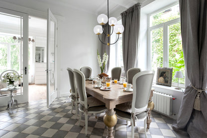 Lennon 31.5 inch pendant in black and brass with clear shade