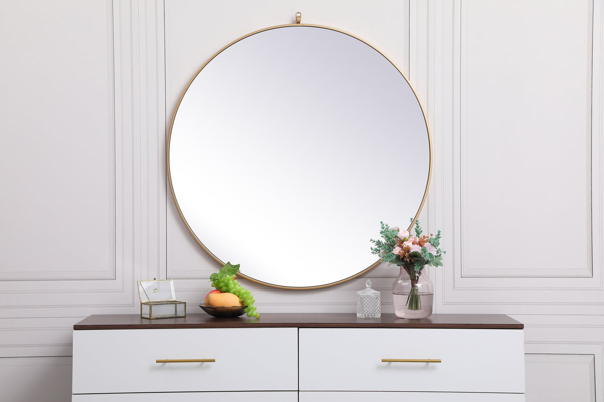 Metal frame round mirror with decorative hook 39 inch in Brass