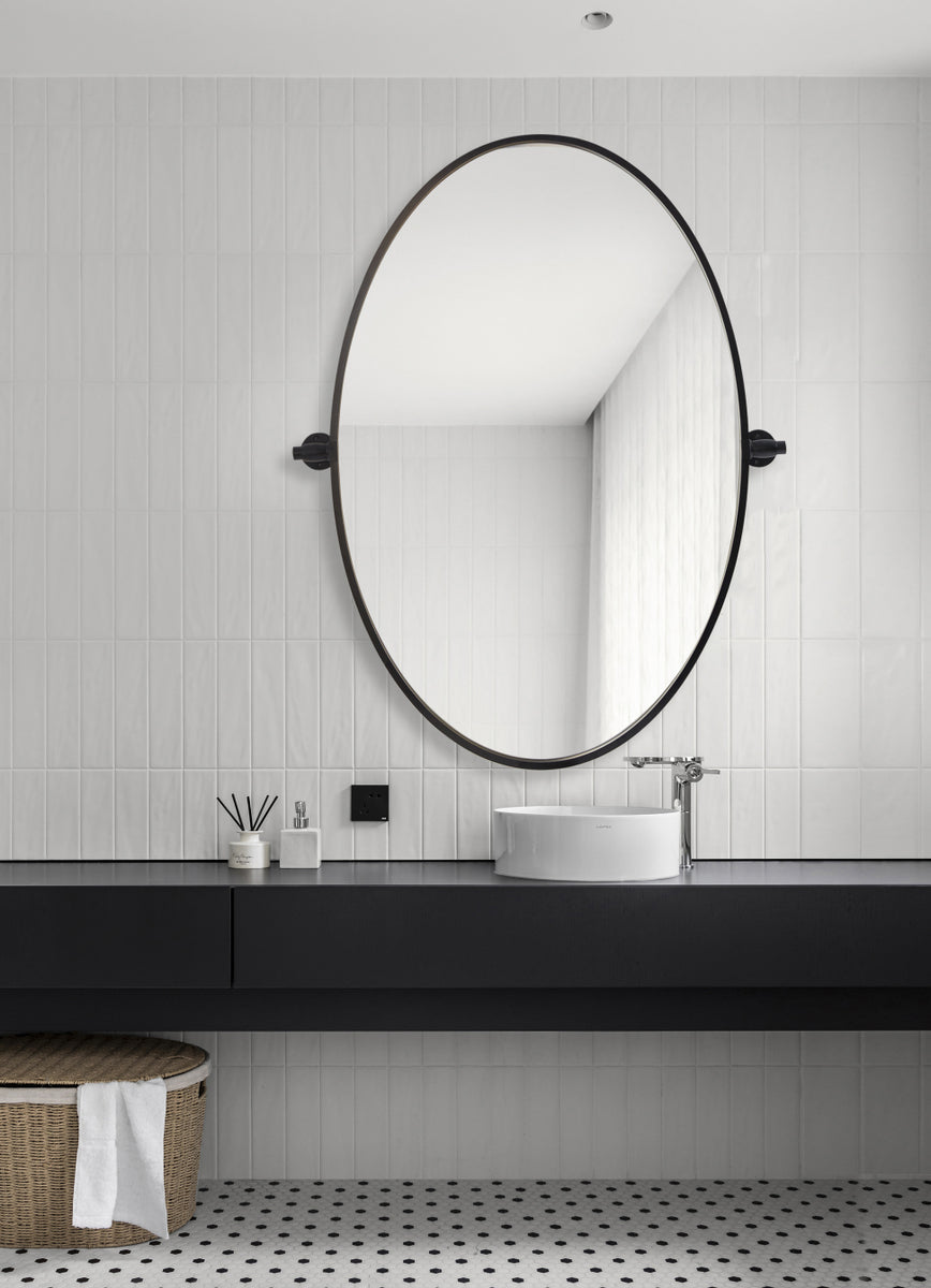 Oval pivot mirror 21x32 inch in black