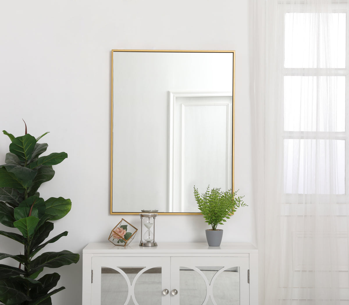 Metal frame rectangle mirror 27 inch in Brass
