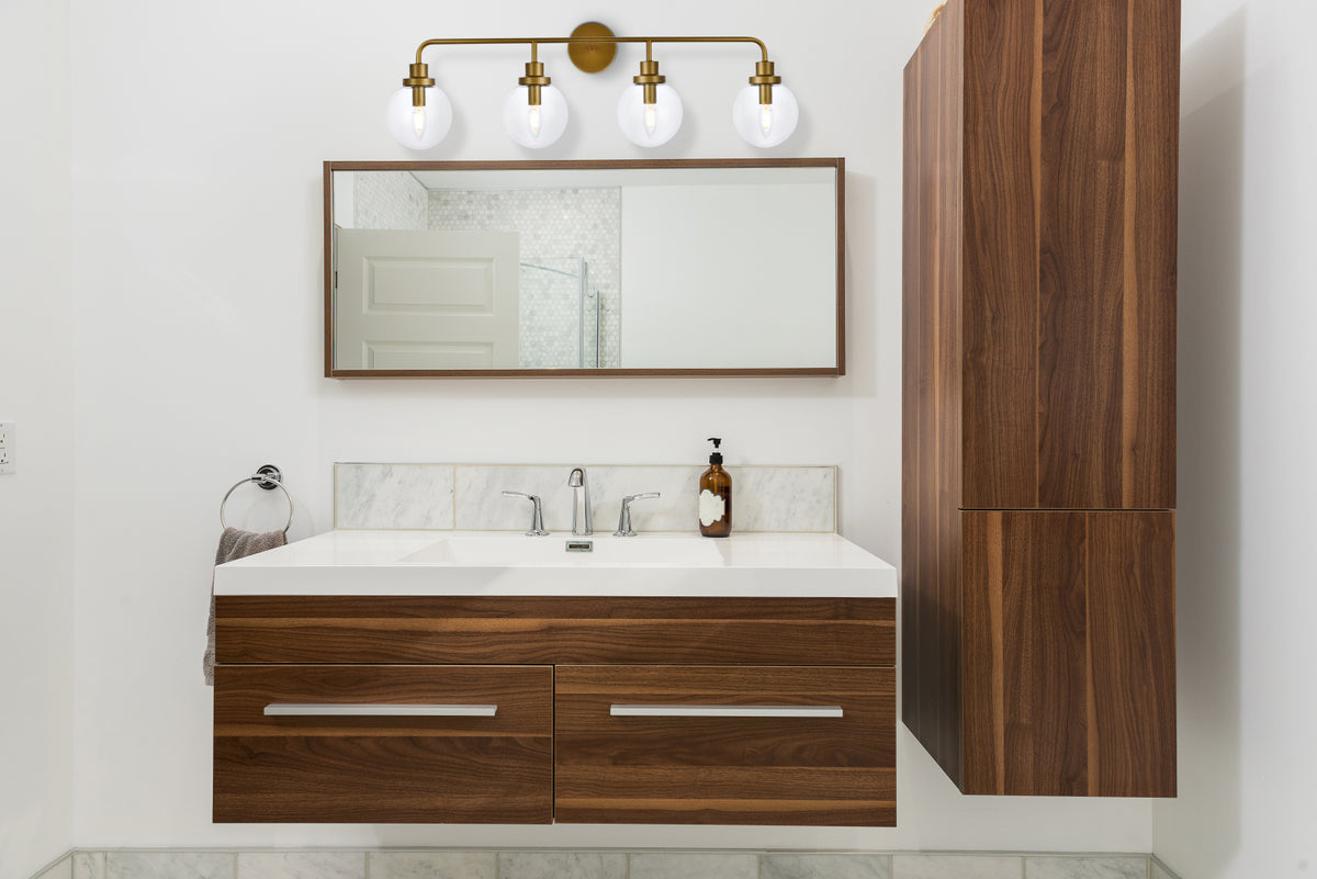 Hanson 4 lights bath sconce in brass with clear shade