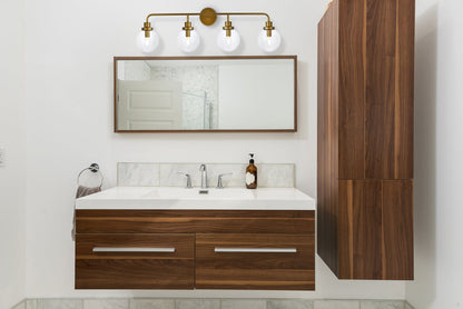 Hanson 4 lights bath sconce in brass with clear shade