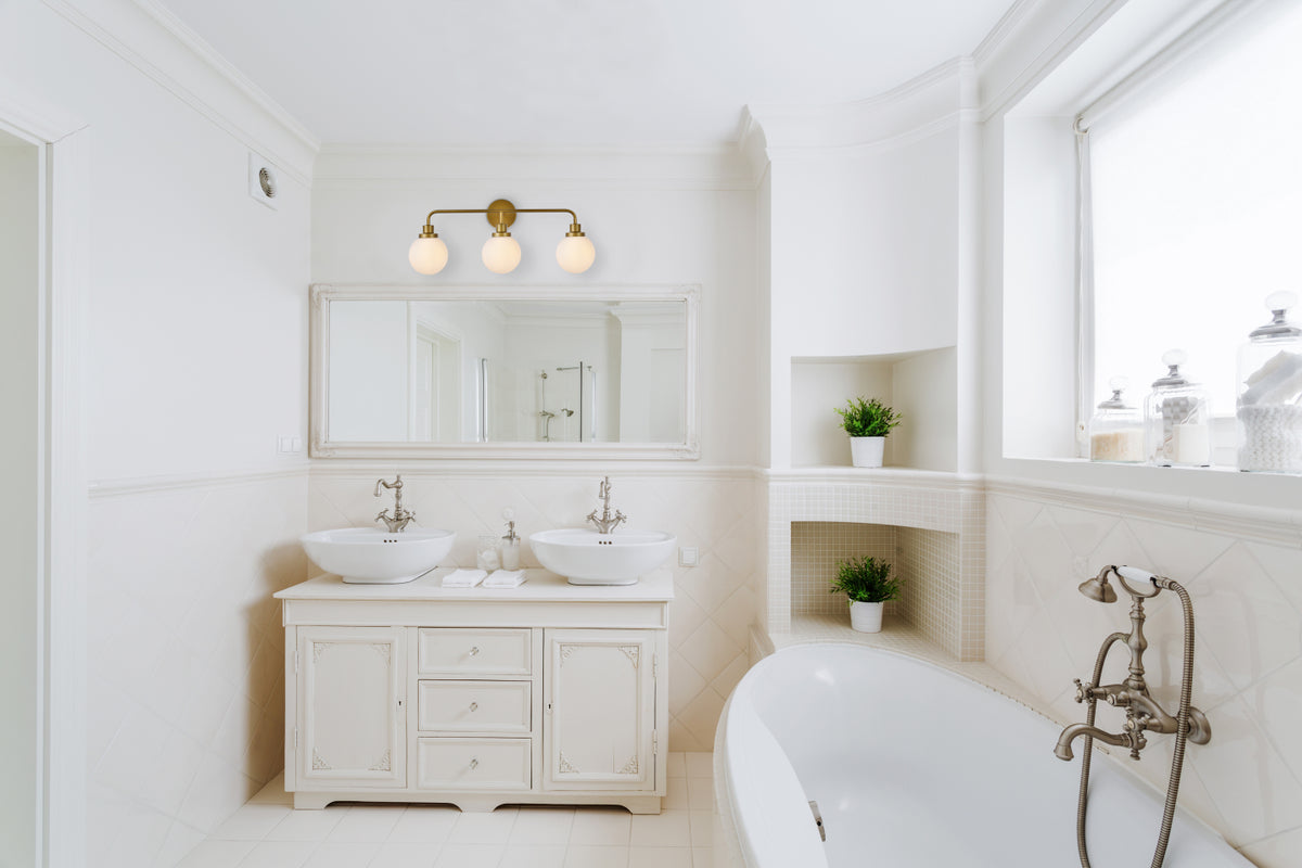 Hanson 3 lights bath sconce in brass with frosted shade