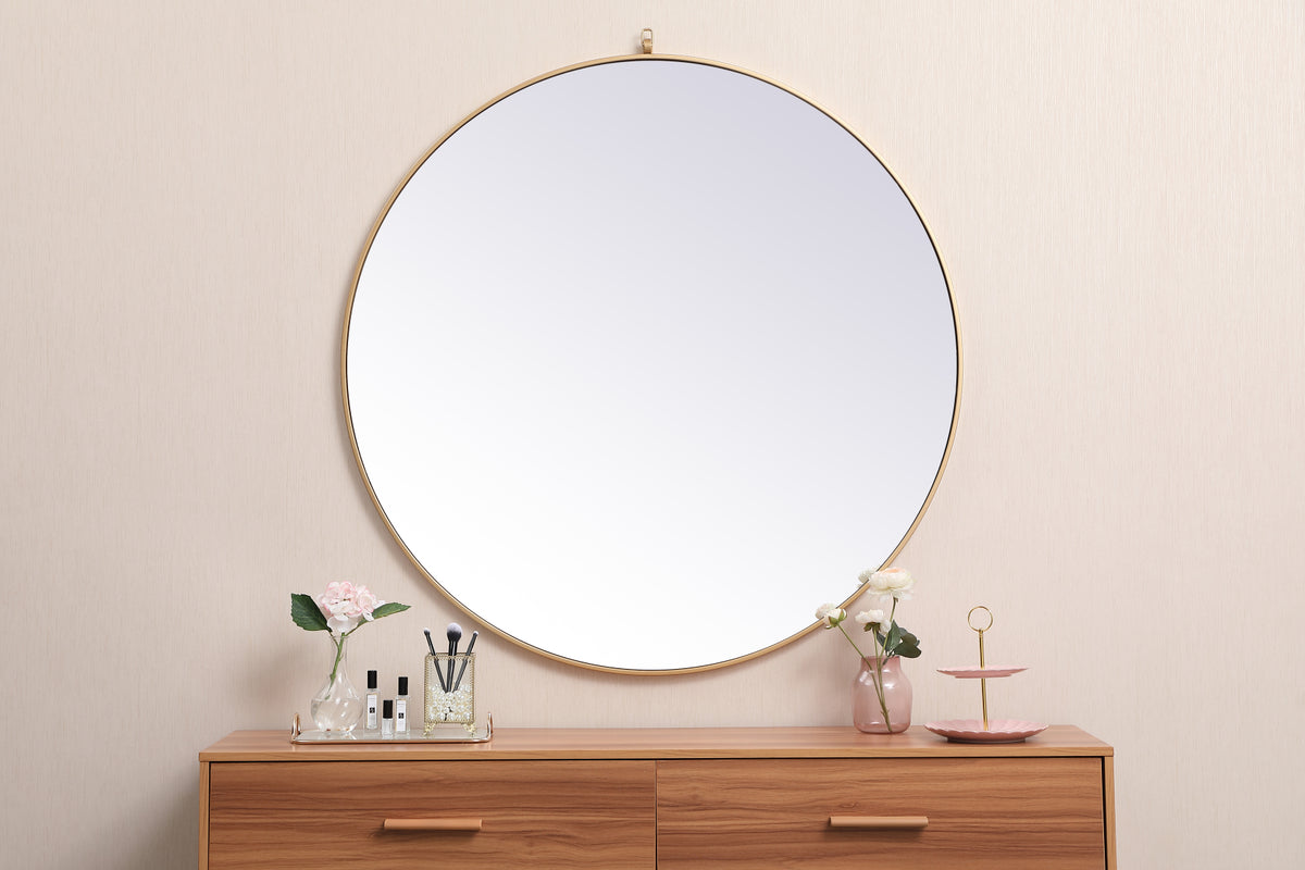 Metal frame round mirror with decorative hook 45 inch in Brass