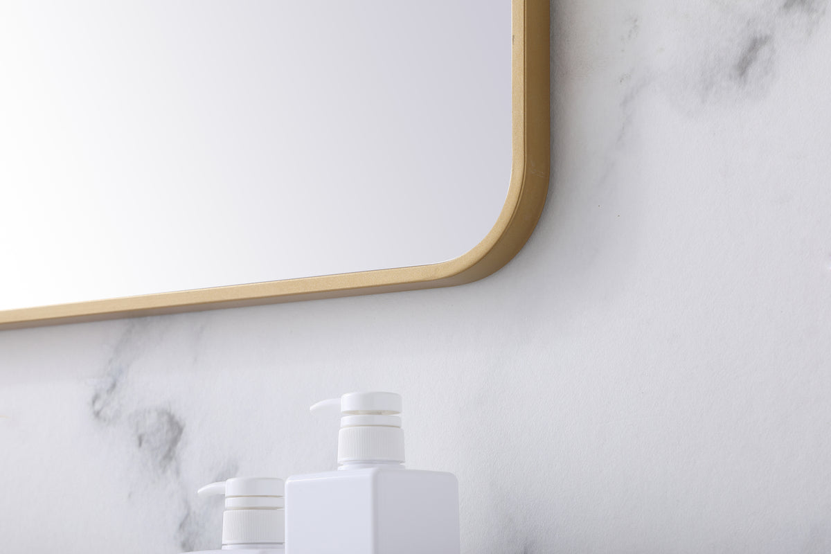Soft corner metal rectangular mirror 27x40 inch in Brass