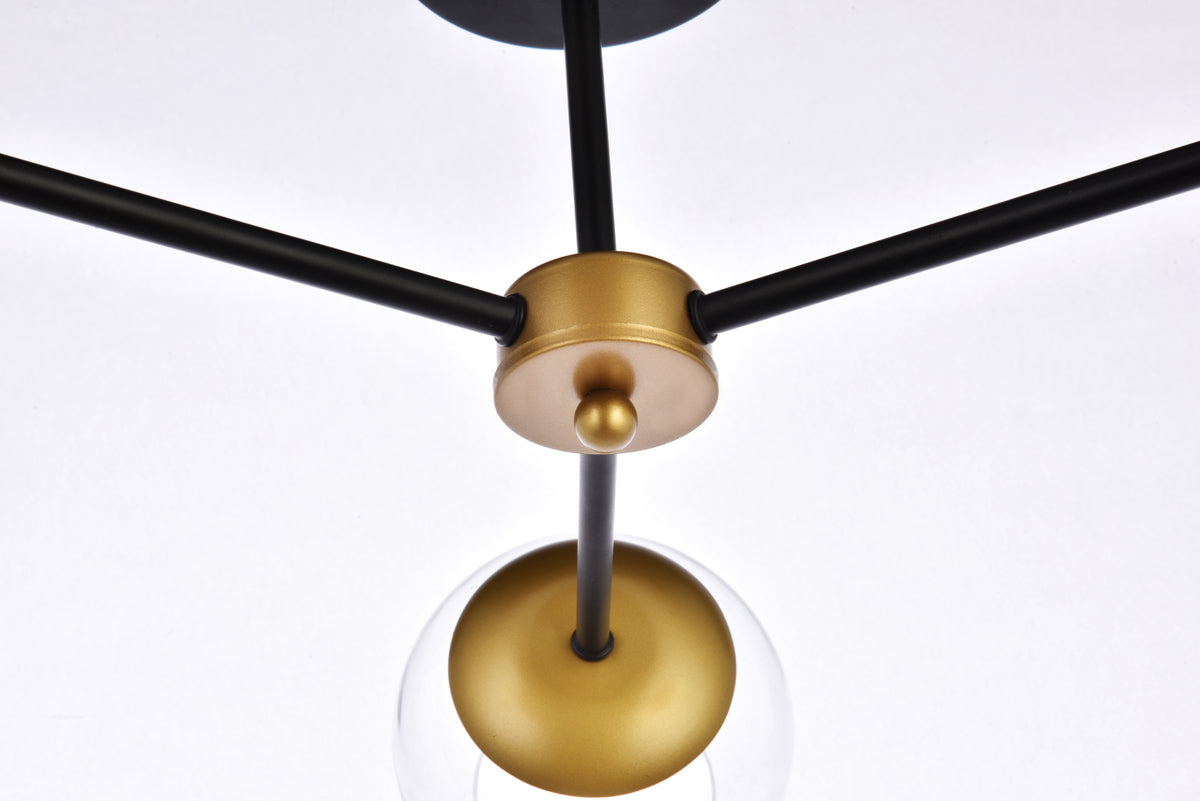 Briggs 26 inch flush mount in black and brass with clear shade