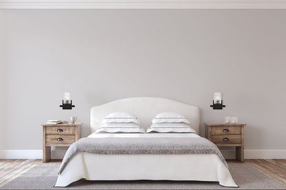 Cassie 1 light bath sconce in black with clear shade