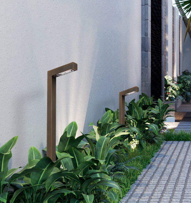 Cast brass modern linear path light