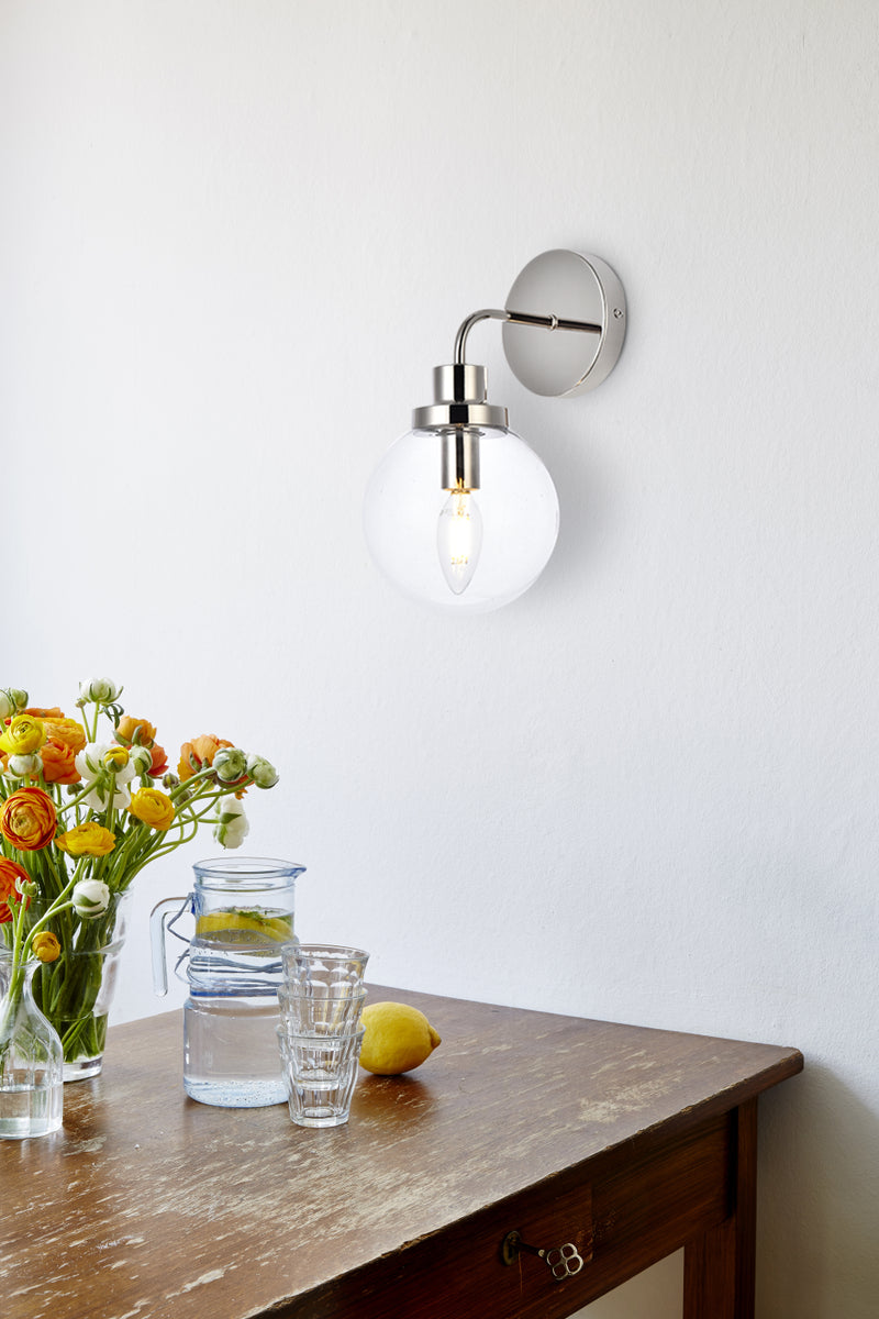 Hanson 1 light bath sconce in polished nickel with clear shade