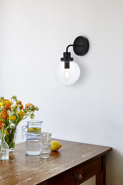 Hanson 1 light bath sconce in black with clear shade