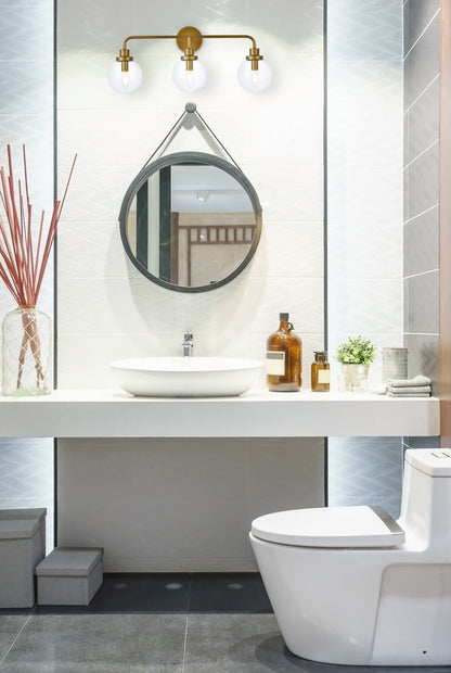 Hanson 3 lights bath sconce in brass with clear shade