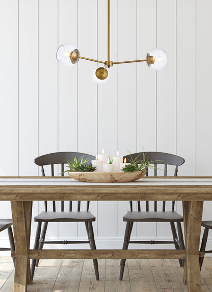 Briggs 32 inch pendant in brass with clear shade
